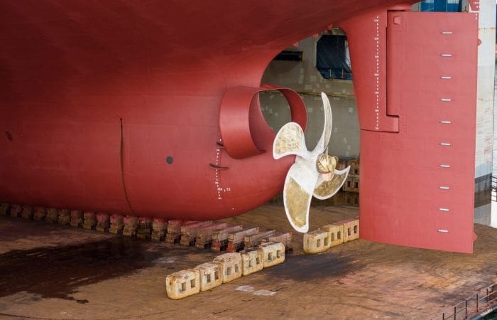 Propellor on rudder of large ship