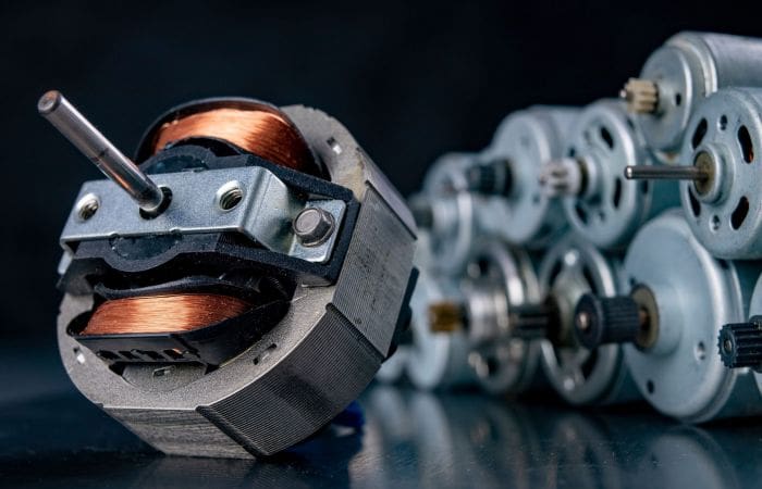 Small electrical motor with intricate parts